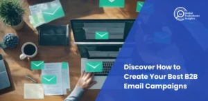Workspace with laptop, coffee cup, and documents, featuring floating email icons and the text “Discover How to Create Your Best B2B Email Campaigns” from Global Tradeshows Insights.